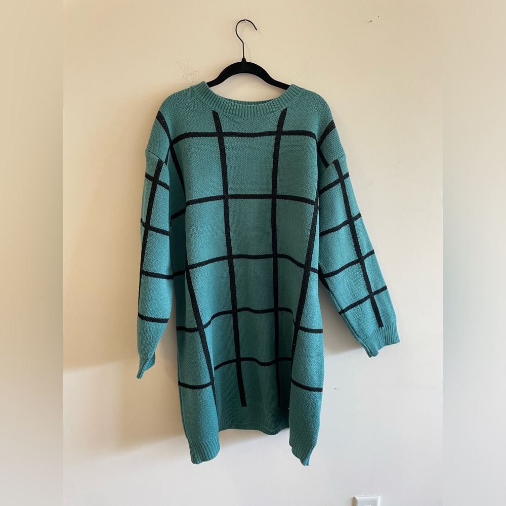 Blue sweater dress with black grid pattern